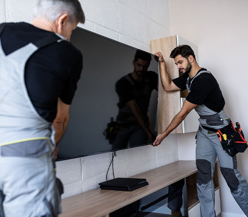 Guys Installing TV