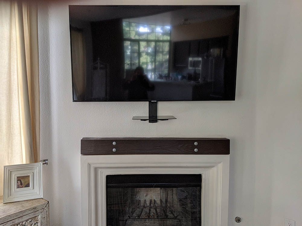 TVinstallguy.com Wall mounted TV above Fireplace