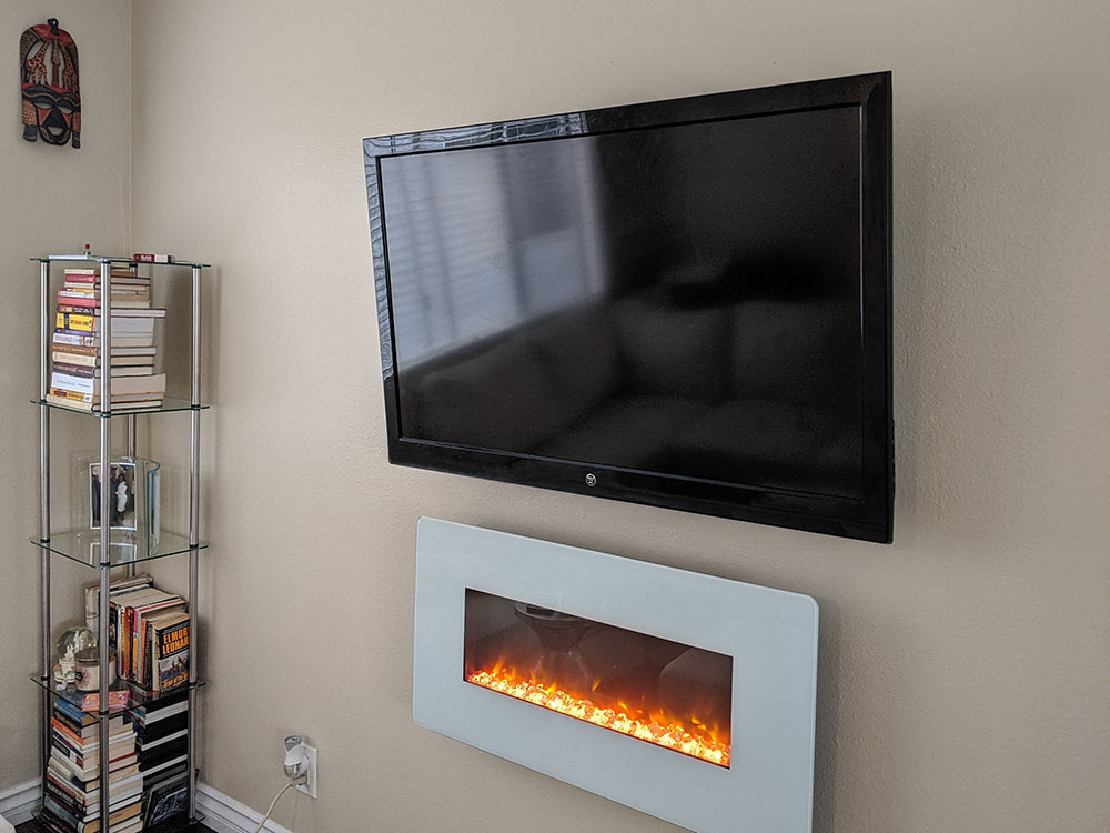 TVinstallguy.com Wall mounted TV above Fireplace