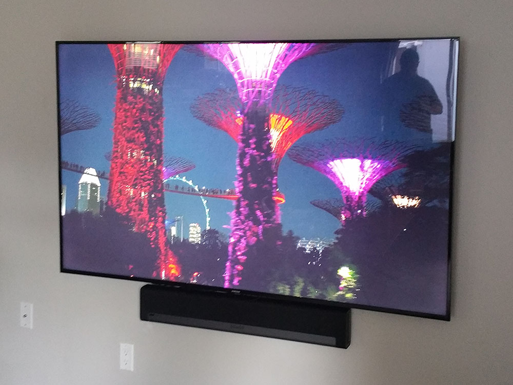 TVinstallguy.com Wall mounted TV with Soundbar