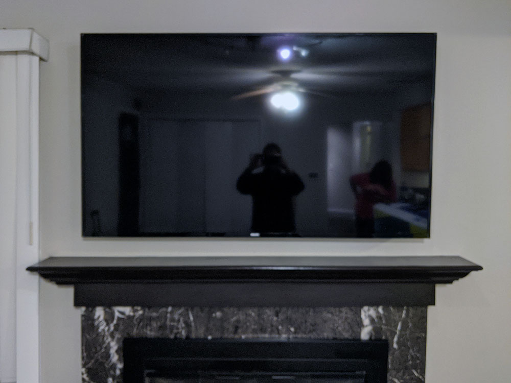 TVinstallguy.com Wall mounted TV above Fireplace